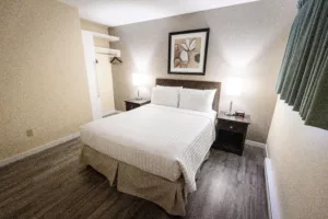 clean comfortable looking bed and bedroom at the siesta inn