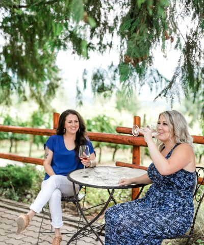 tasting wine on a patio at a shuswap winery