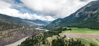 mountain and valley view of river and vineyards in Lillooet