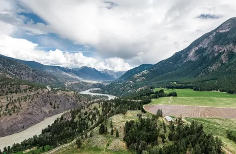 mountain and valley view of river and vineyards in Lillooet